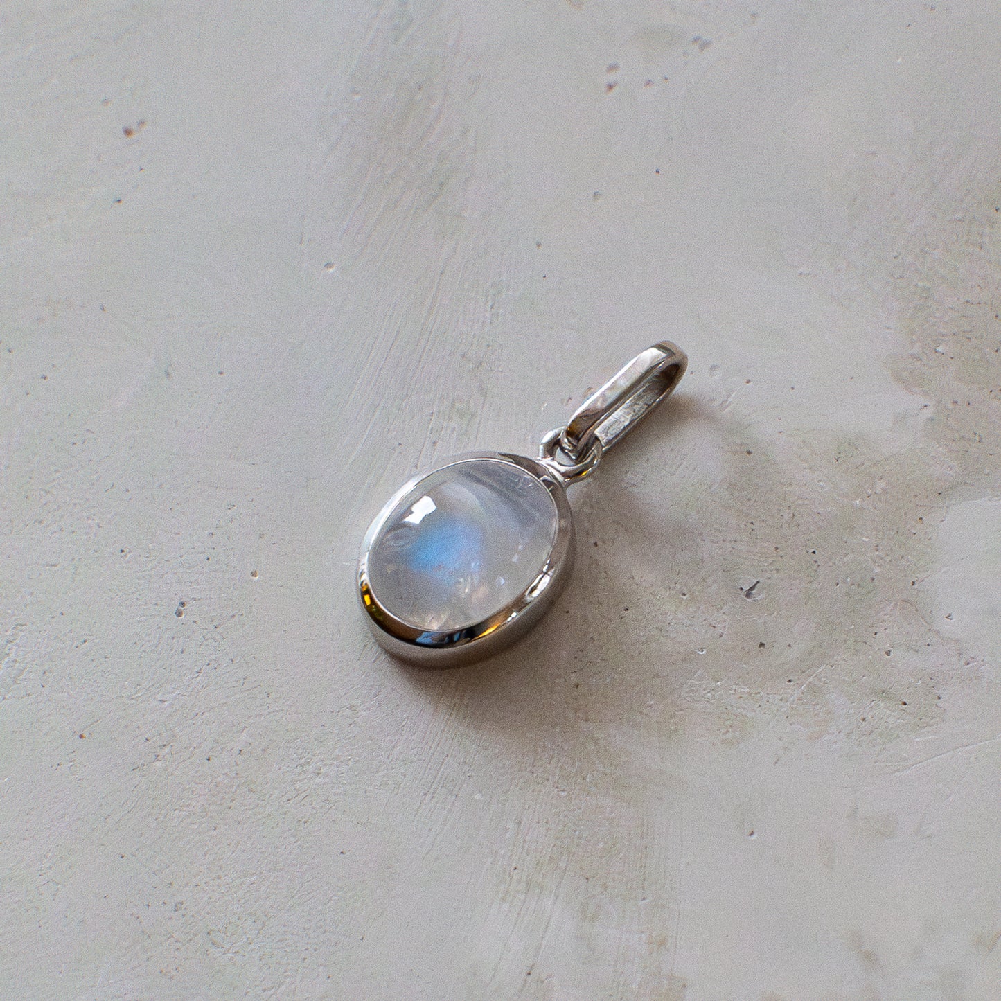 Moonstone Gold Pendant in white gold and designed in Switzerland.